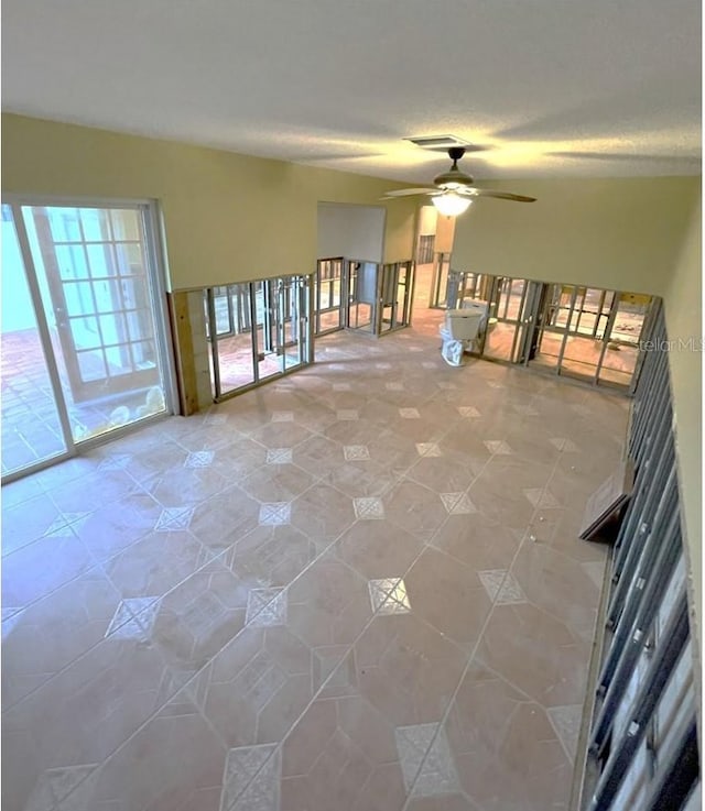 empty room featuring ceiling fan