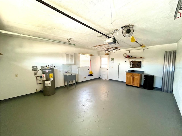 garage with a garage door opener, water heater, and sink