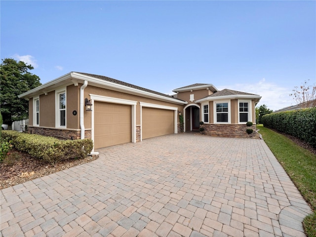 view of front of home with a garage