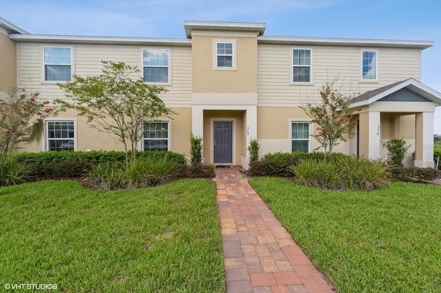 view of front facade with a front lawn