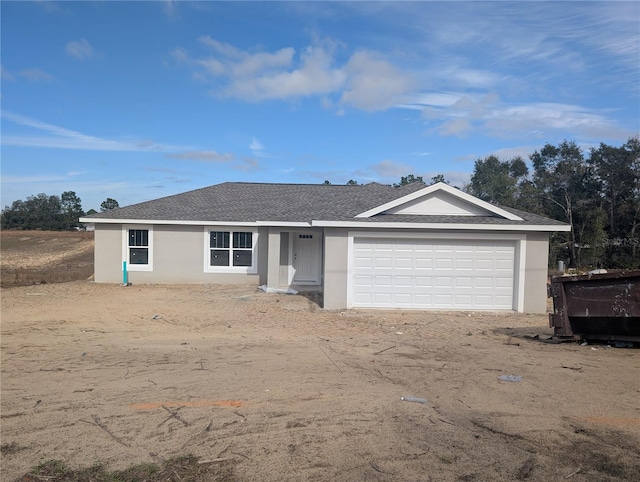 single story home with a garage