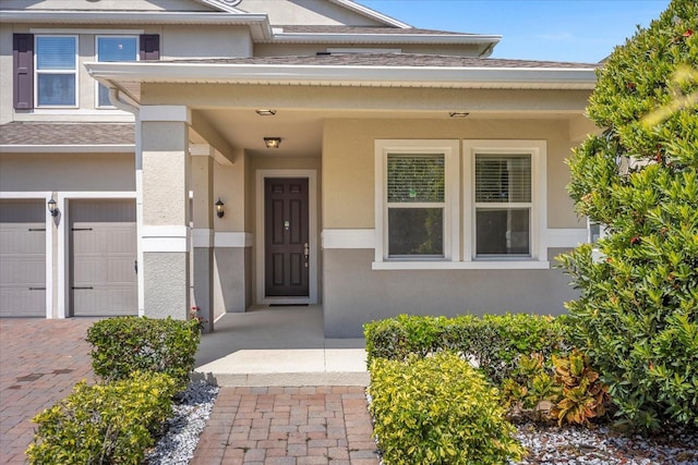 entrance to property featuring a garage