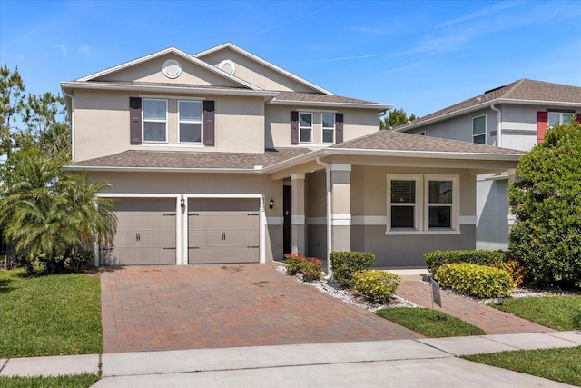 view of front of home with a garage