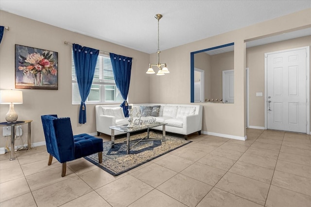 tiled living room featuring an inviting chandelier