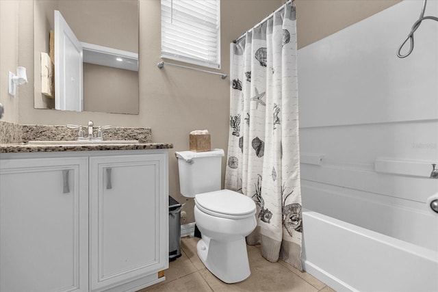 full bathroom with toilet, tile patterned floors, shower / tub combo with curtain, and vanity