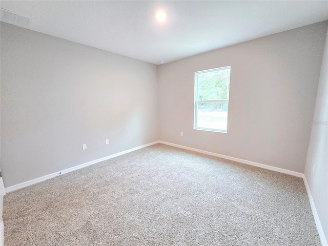 view of carpeted spare room