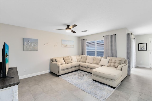 living room with ceiling fan