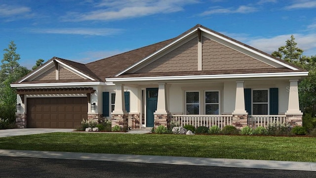 craftsman-style home featuring a front yard and a garage