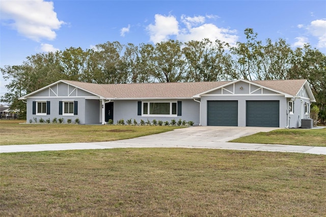 ranch-style house featuring cooling unit, a front lawn, and a garage