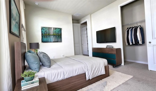 bedroom with a closet and carpet flooring