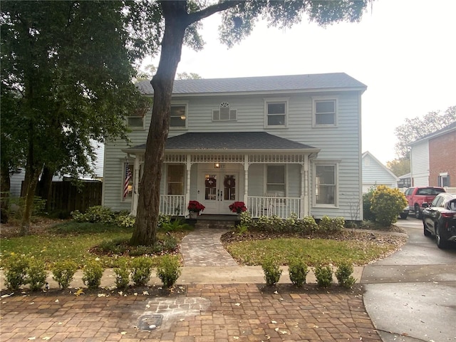 view of property with covered porch