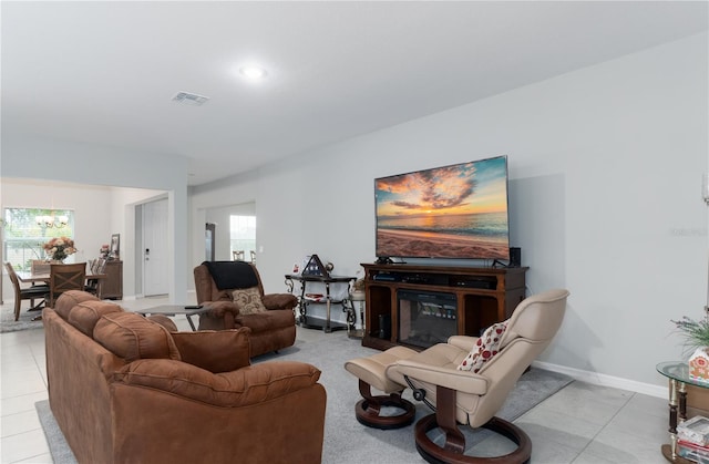 living room featuring light tile patterned flooring