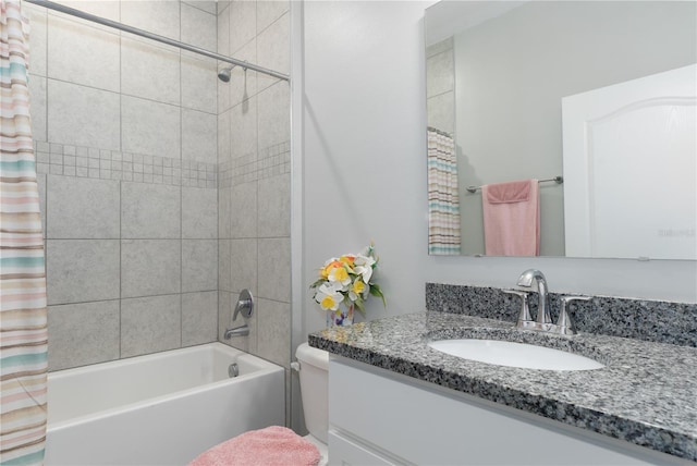 bathroom featuring vanity and shower / bath combination with curtain