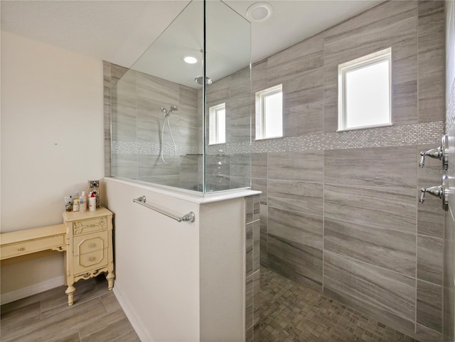 bathroom featuring tiled shower