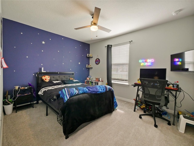 bedroom with light colored carpet and ceiling fan