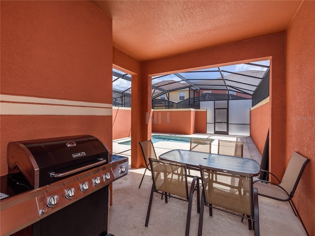 exterior space featuring grilling area and a lanai