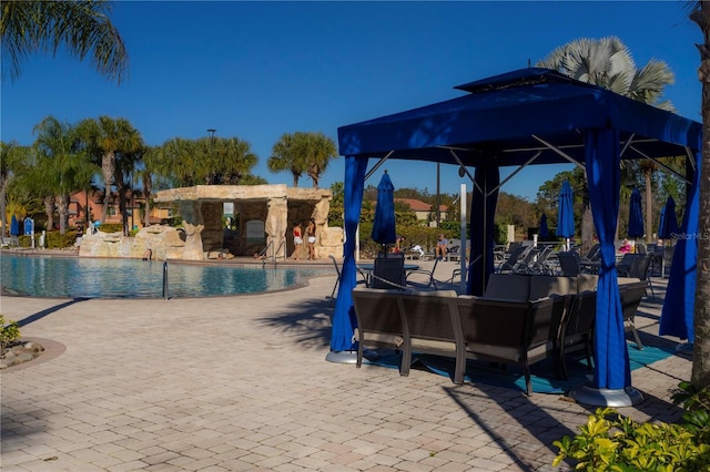 view of pool with a patio area and a gazebo