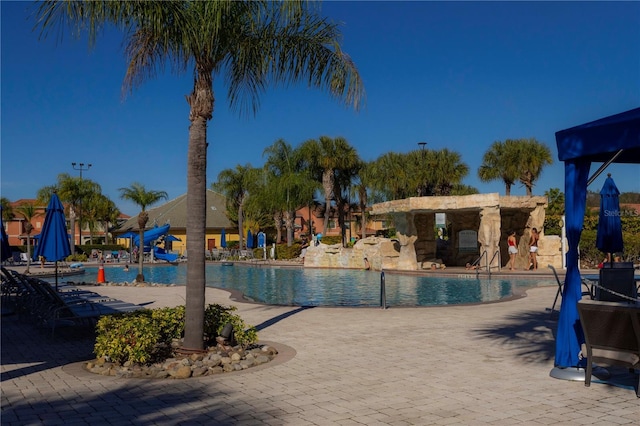 view of pool featuring a patio area