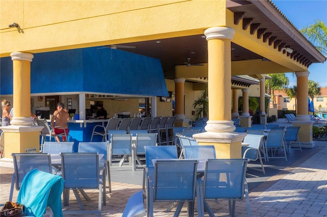 view of patio with ceiling fan