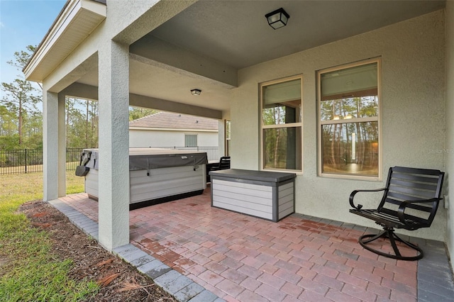 view of patio featuring a hot tub