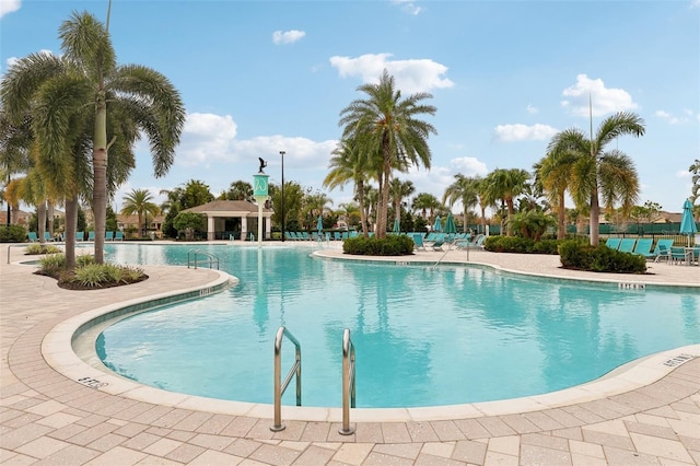 view of swimming pool featuring a gazebo and a patio area