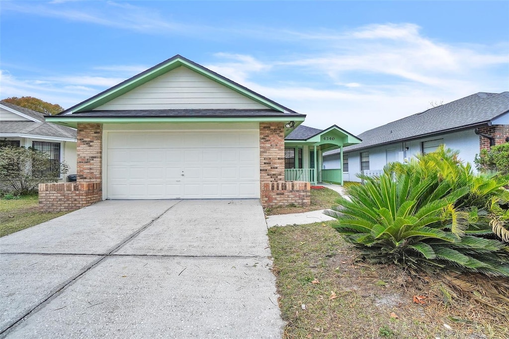 single story home with a garage