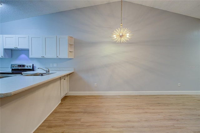 kitchen with white cabinetry, electric range, hanging light fixtures, a textured ceiling, and sink