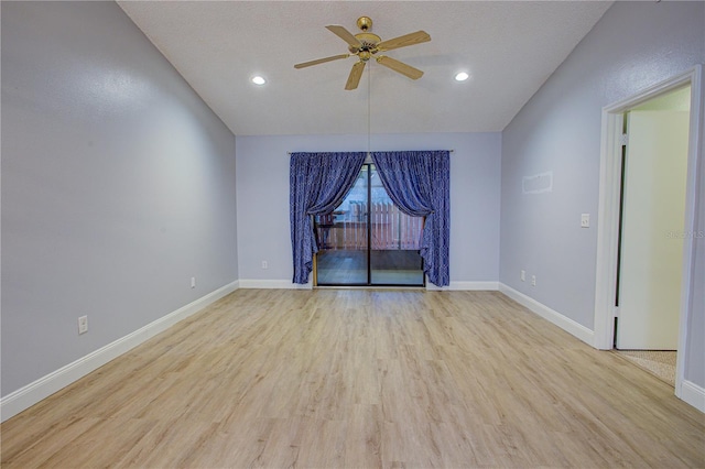 spare room with ceiling fan, a textured ceiling, and light hardwood / wood-style flooring