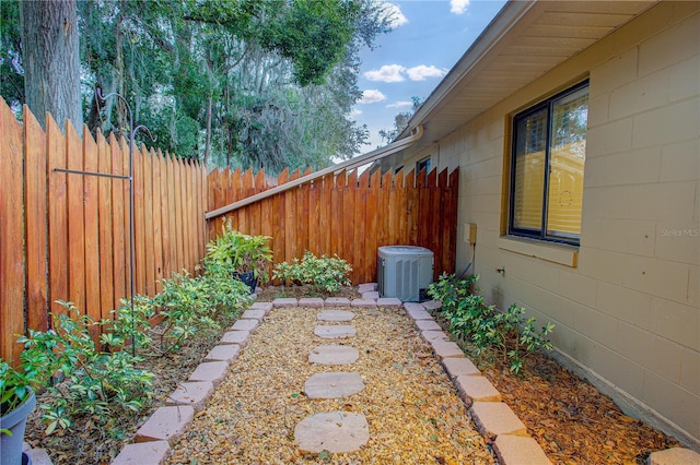 view of yard with central AC