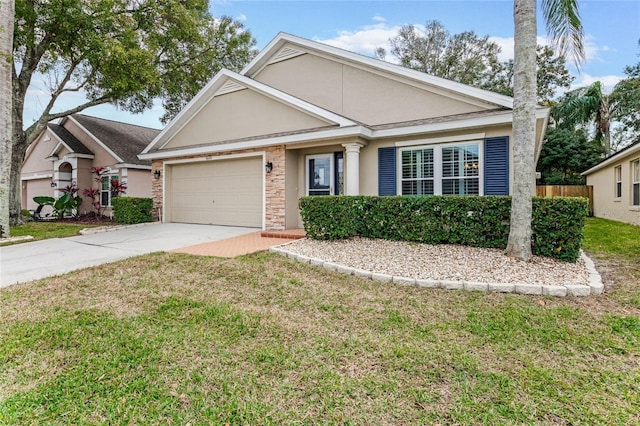 view of front of property with a garage and a front yard