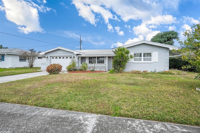 ranch-style house with a front yard, a garage, and covered porch