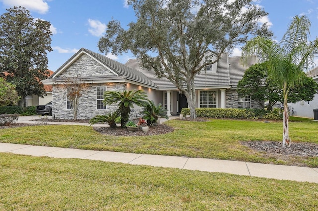 view of front of house with a front lawn