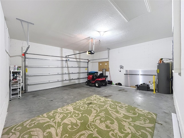 garage with water heater and a garage door opener