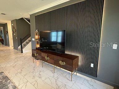 living room featuring ornamental molding