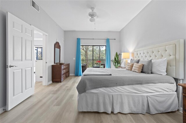 bedroom featuring ceiling fan, access to outside, and light wood-type flooring