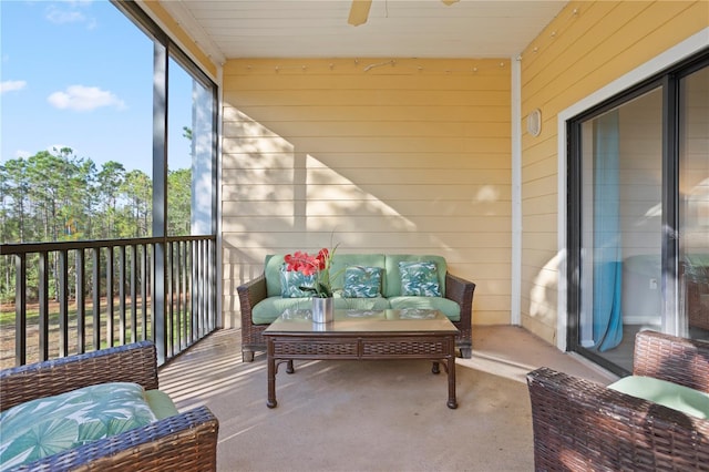 balcony featuring ceiling fan and outdoor lounge area