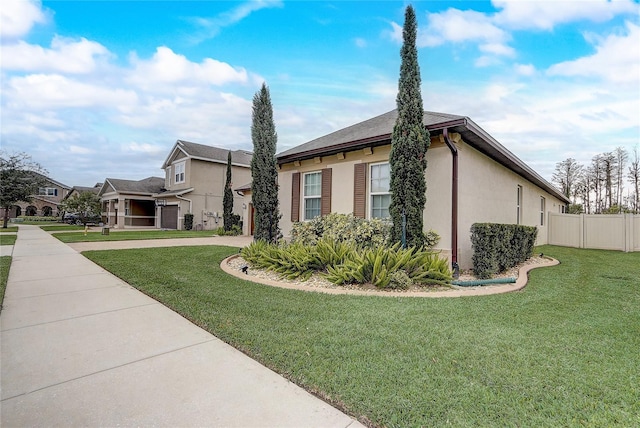 view of property exterior with a lawn