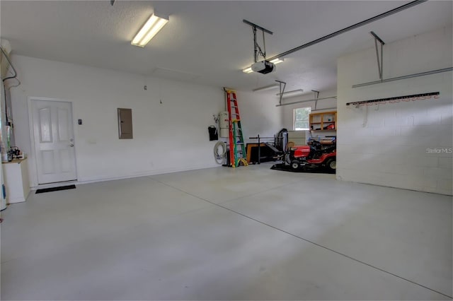 garage featuring electric panel and a garage door opener