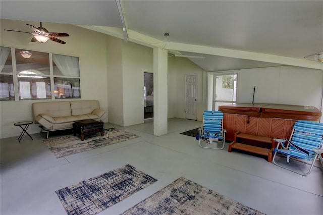 living room featuring concrete floors and ceiling fan