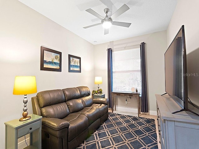 living room featuring ceiling fan