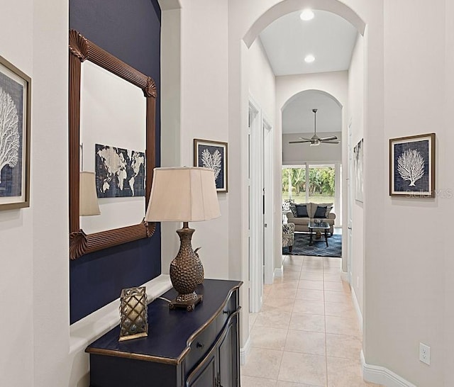 hallway with light tile patterned flooring