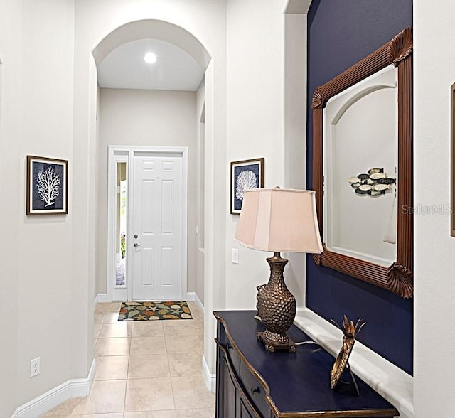 foyer featuring light tile patterned floors