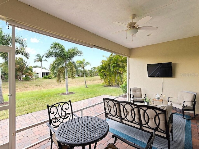 view of patio featuring ceiling fan and an outdoor hangout area