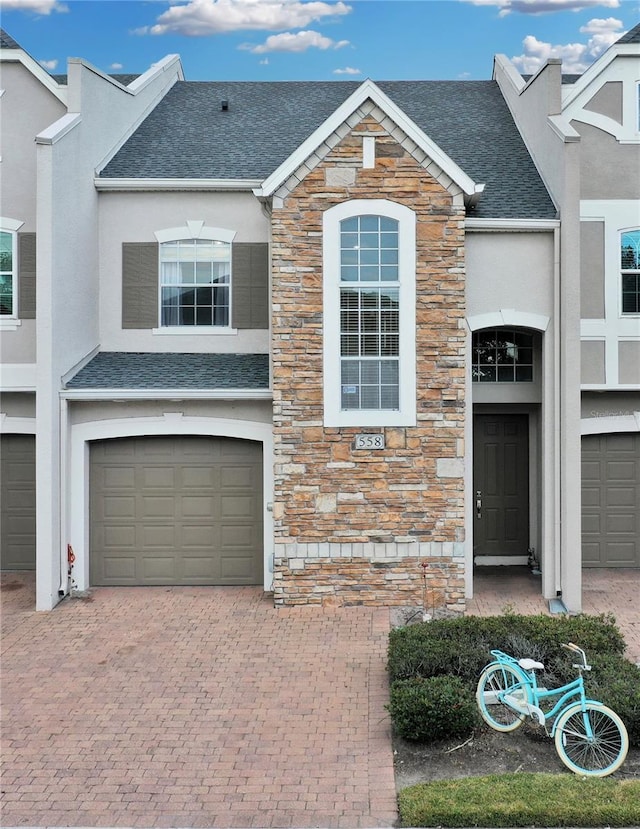 view of front of property with a garage