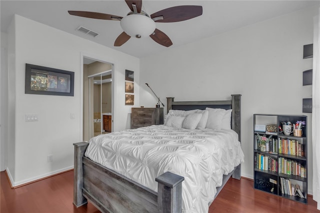 bedroom featuring ceiling fan and dark hardwood / wood-style flooring