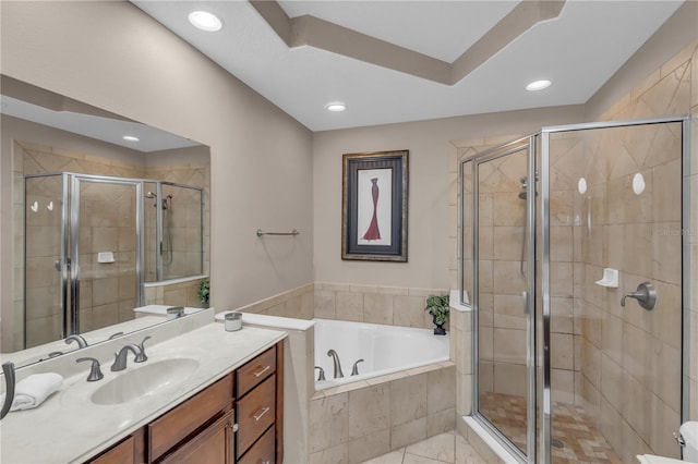 bathroom with independent shower and bath, tile patterned flooring, and vanity