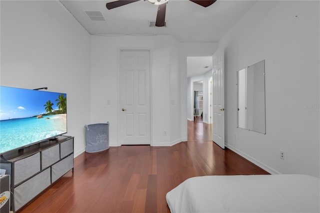 bedroom featuring ceiling fan and hardwood / wood-style flooring