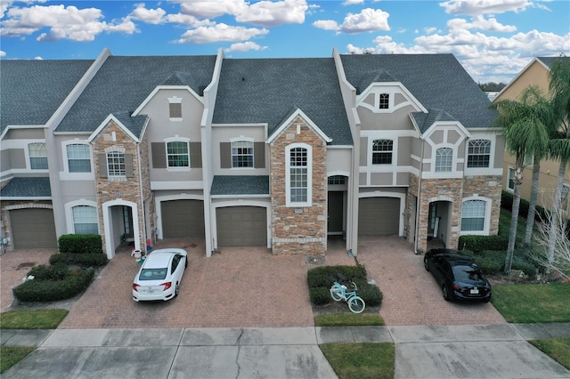 view of front of property featuring a garage