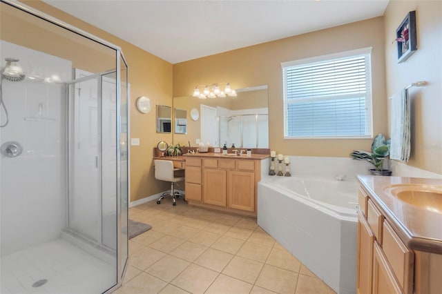 bathroom with vanity, tile patterned flooring, and separate shower and tub