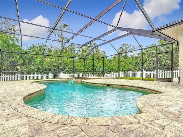 view of pool featuring a lanai and a patio area